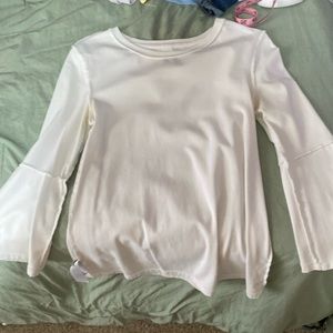 White flared top stain under the arm